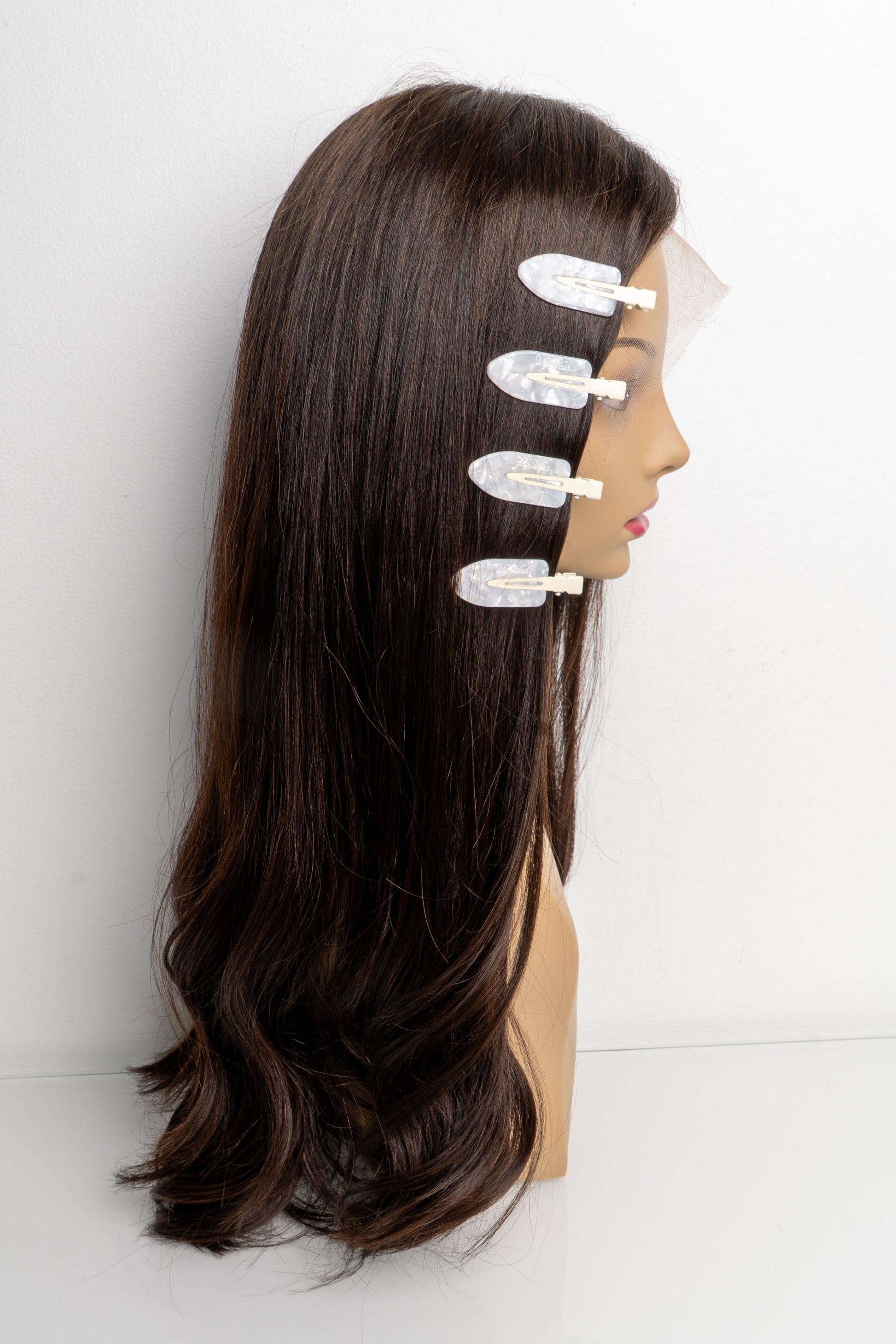 No dent hair clips for wigs and extensions displayed on styled mannequin head